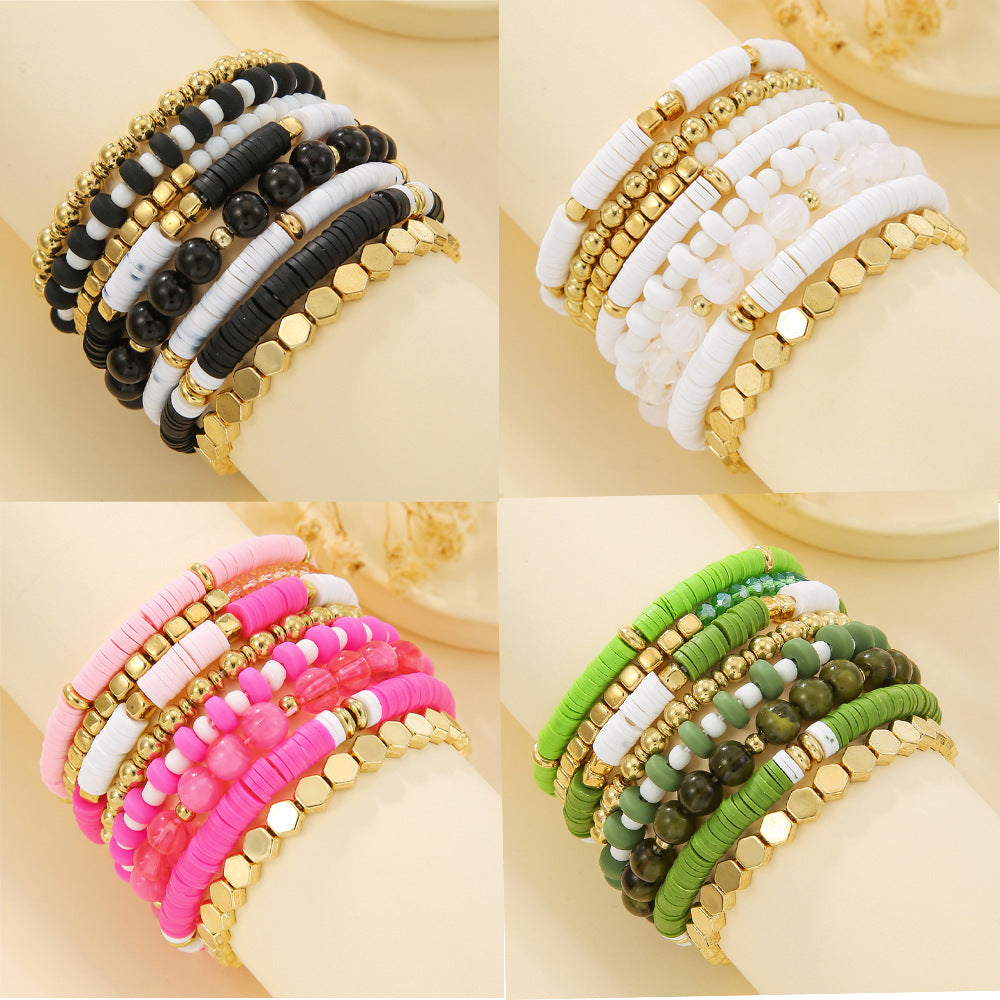 Four colorways of the beaded bracelet set, white green black and pink stacks side by side