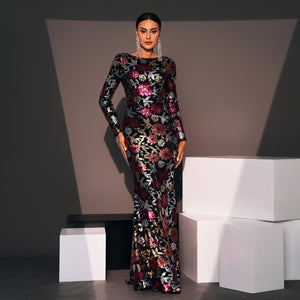 Sequin long sleeve evening dress shown full length on model