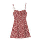 Self tie shoulder strap detail on the floral mini dress bodice