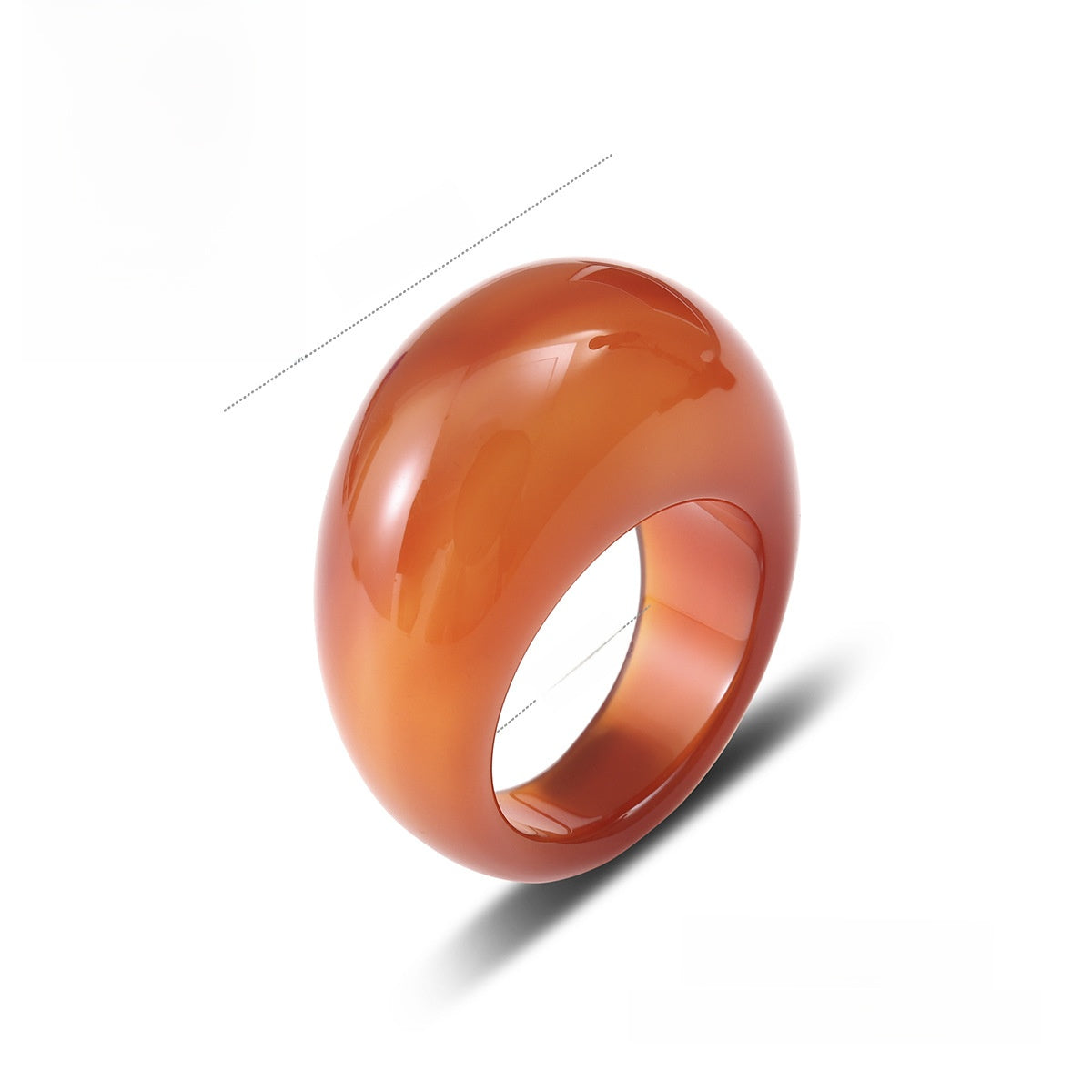 Carnelian stone ring carved solid, shown angled on a plain background