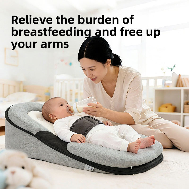 Woman holding a bottle to a baby on a grey wedge lounger pillow with a strap, beside a headline about breastfeeding
