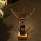 Close-up of the wooden figurine showing natural grain and smooth finish
