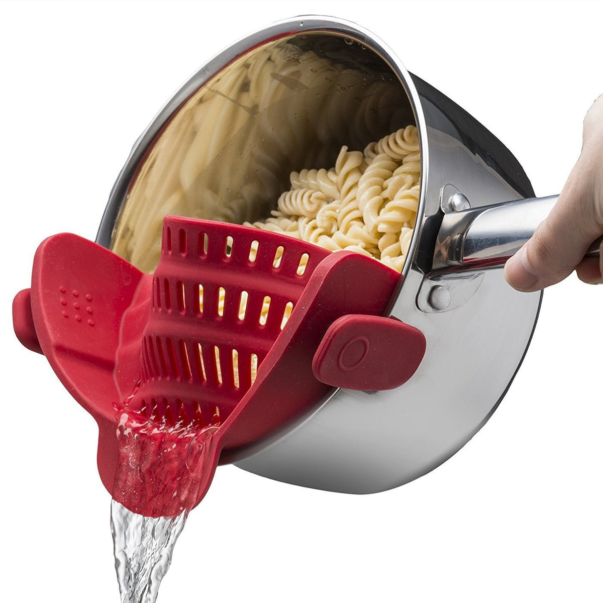 Red silicone clip-on pot strainer, variant photo, clipped to a pot held by hand with water draining