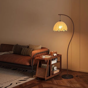 Side profile of the arc floor lamp showing the curved pole and single dome shade
