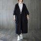 Cupro blend hooded coat displayed flat to show the button front and patch pockets