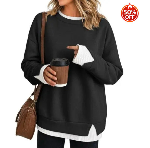 Front view of a off white long sleeve sweatshirt with round neck and layered hem look