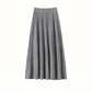 Light gray ribbed knit tiered midi skirt with a wide ribbed waistband, flat front view on white