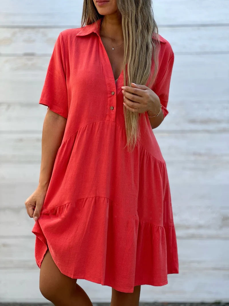 White short sleeve cotton and linen tiered shirt dress showing the soft cotton and linen blend drape