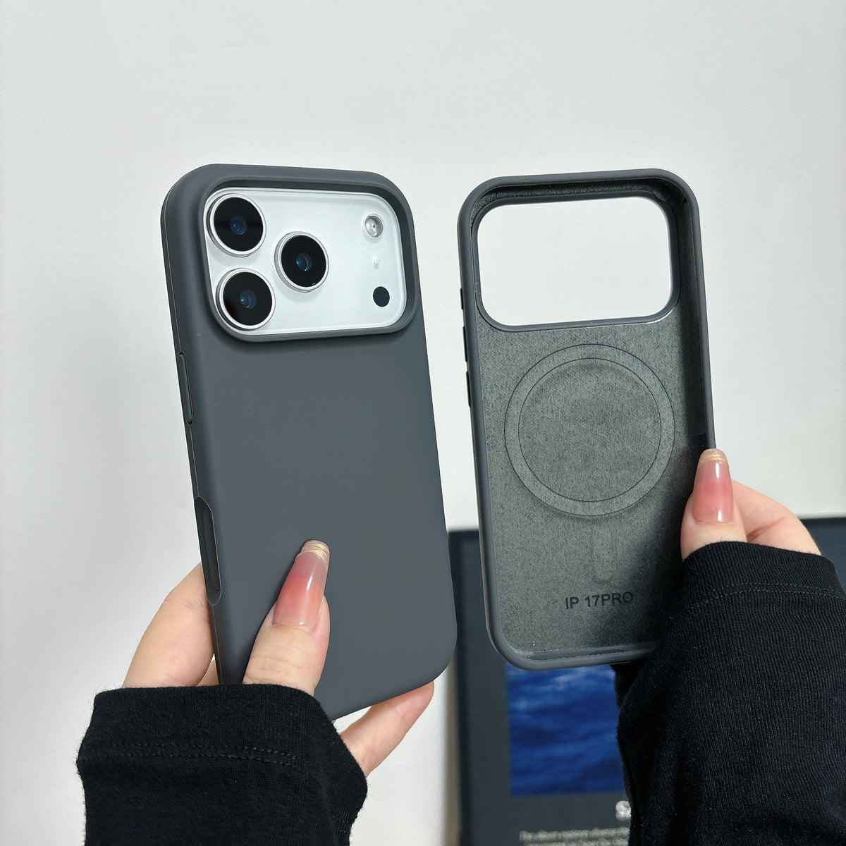 Magnetic silicone phone case with full back and side coverage and raised protective edges on white