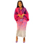 Pleated batwing midi dress with all over accordion pleats on a standing model, standing pose front