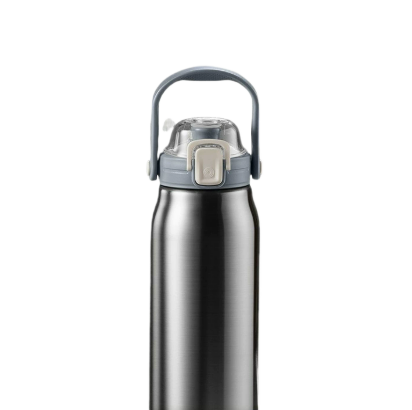 Tumbler holding iced water through a clear reusable straw