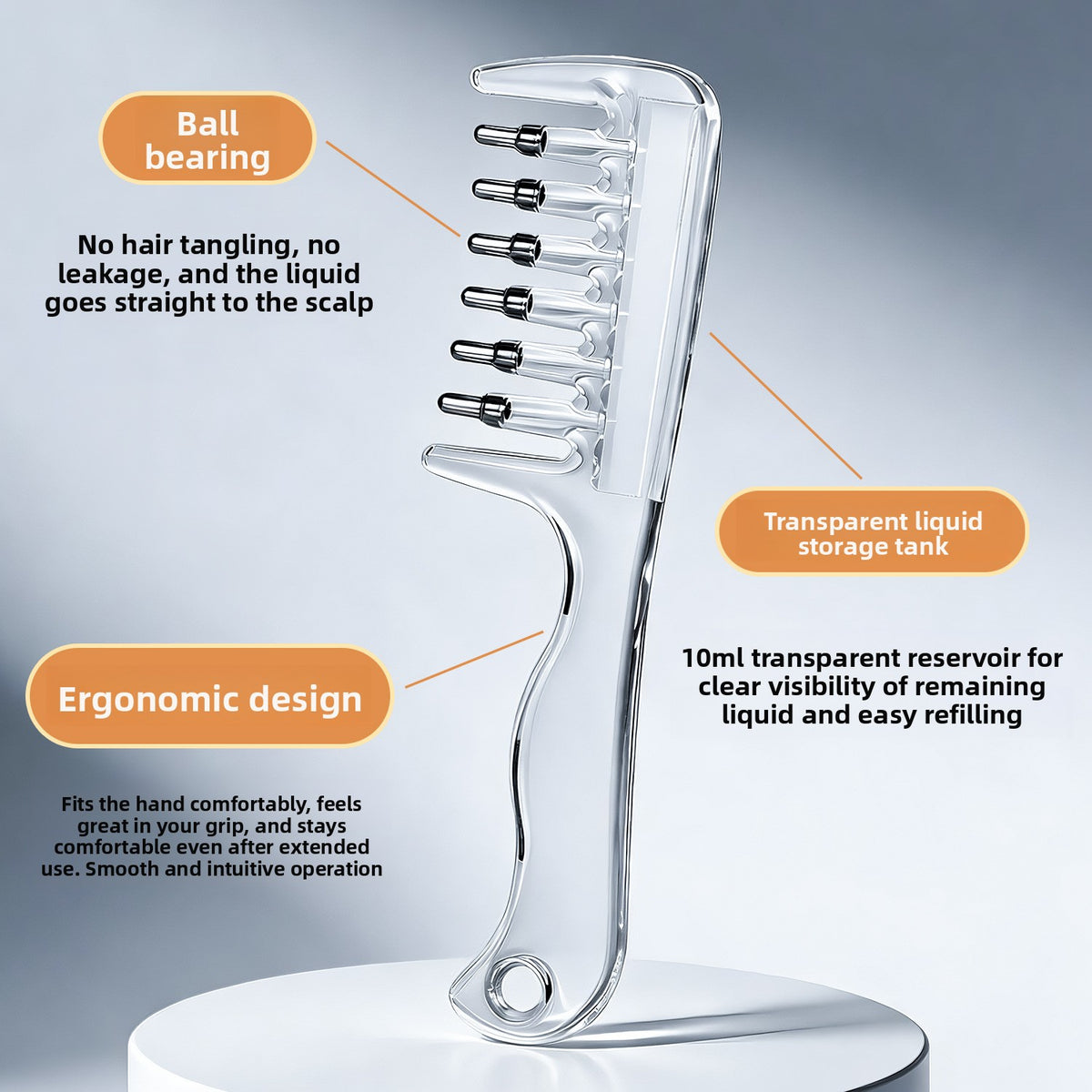Clear scalp applicator comb with six ball bearing teeth and ergonomic handle, labelled transparent liquid storage tank