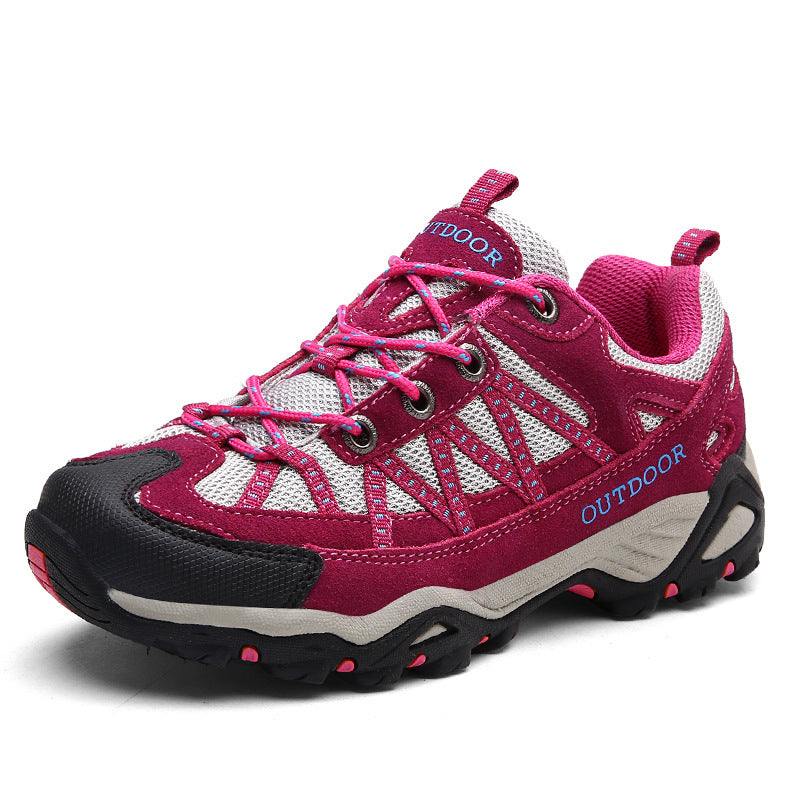 Top view of a lace up hiking shoe showing the mesh and suede upper