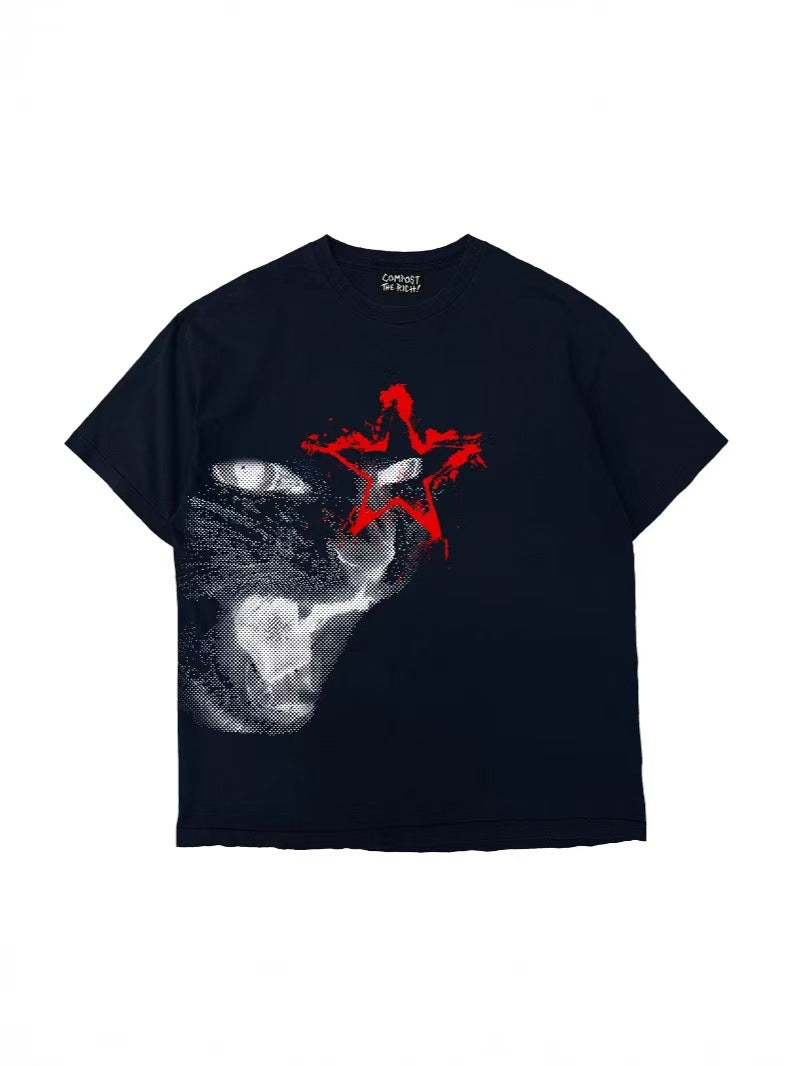 Black oversize short sleeve tee with a snarling cat halftone print and a red star on a white background