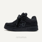 Pair of M018 tweed lace-up sneakers shown side by side