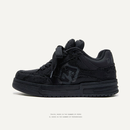 Pair of M018 tweed lace-up sneakers shown side by side