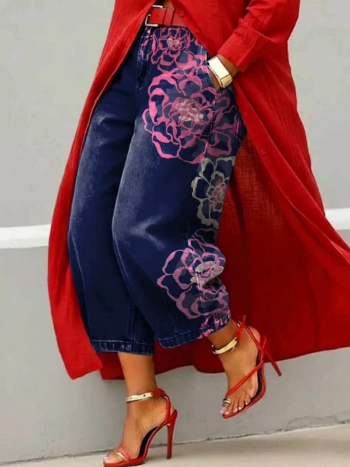 Wide leg cropped dark navy denim jeans with pink peony outline print, red coat and heels