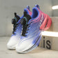 Pair of childrens two tone gradient sneakers showing the breathable mesh upper and dial closure