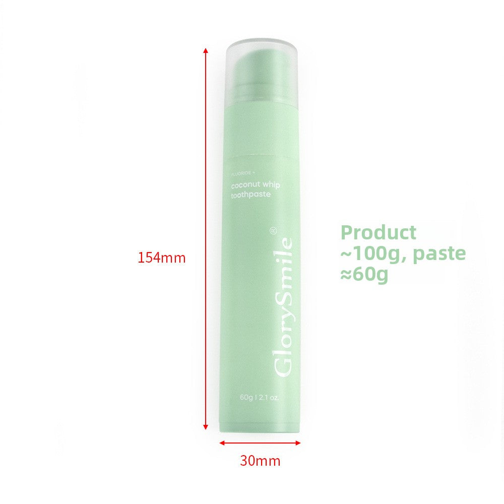 GlorySmile fruity fluoride toothpaste tube standing on its pump cap