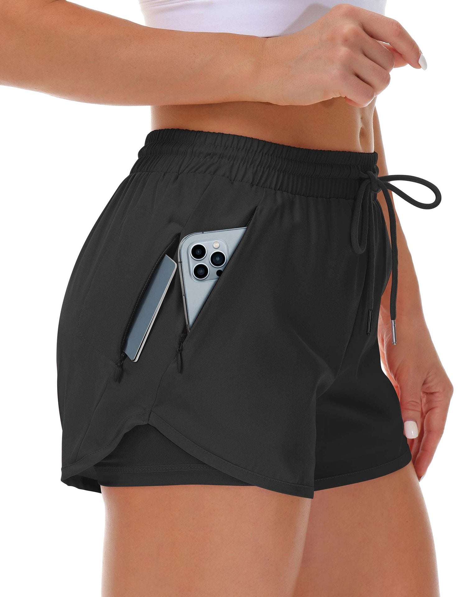 A light purple womens fitness shorts with drawstring elastic waistband, front view on model
