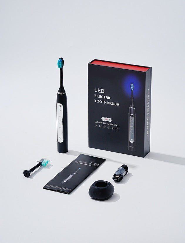 Black IVISMILE LED electric toothbrush with retail box, manual and stand, option image for Black Blue Light Neutral