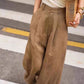 Side view of high waist cotton linen wide leg trousers falling in a full straight column