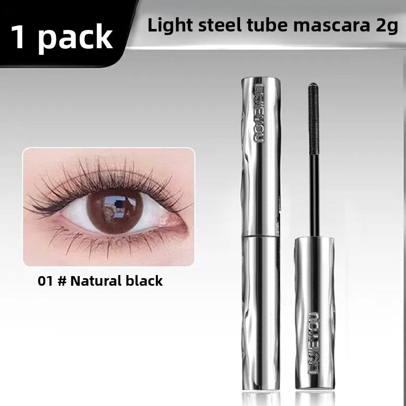 Mascara wand coating lashes from root to tip for curl