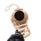 Coconut shell reptile hideout with a wooden rope ladder inside an enclosure
