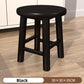 Detail of the tapered rubberwood leg meeting the round seat with smooth joinery