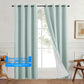 Linen look polyester blackout grommet curtain panel with white thermal backing pleated on a slim black rod over a tall window