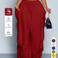 High waist wide leg linen look viscose drawstring trousers, styled with a tank and sandals