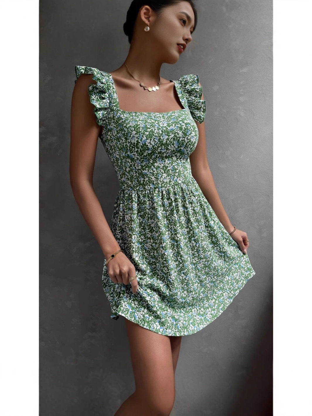 Floral square neck mini dress showing the open back that ties with a bow, front and back views