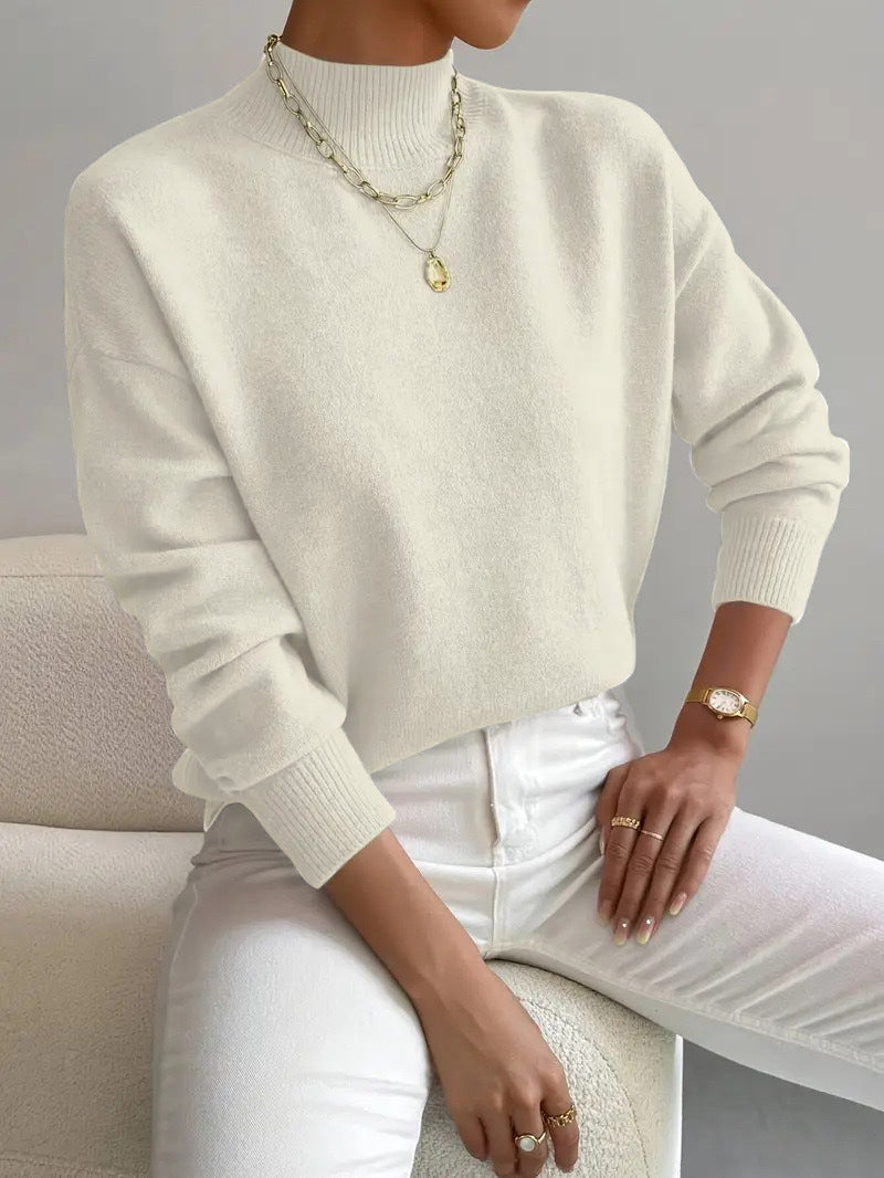 Ivory White half-high neck pullover sweater with long sleeves worn with white trousers, size XL variant image