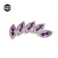 Titanium piercing stud shown with the stone top and threaded post separated