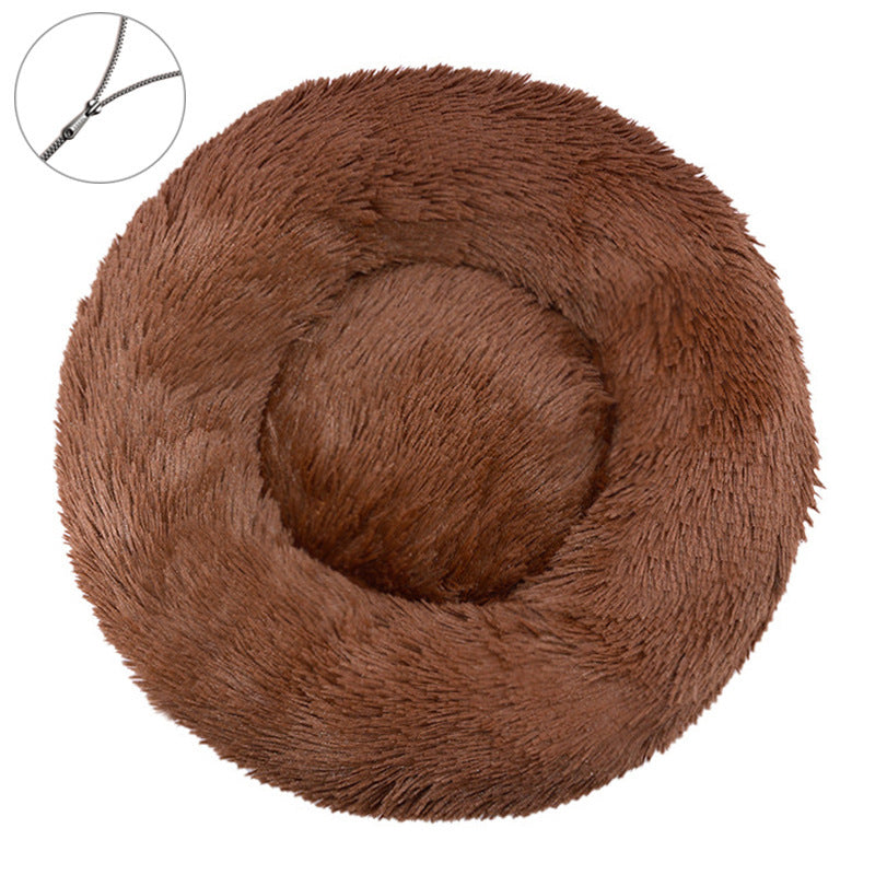 Dark brown round plush pet bed with a raised bolster rim on a plain background