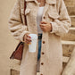Womens plush fleece button front long coat in brown, chest pocket detail