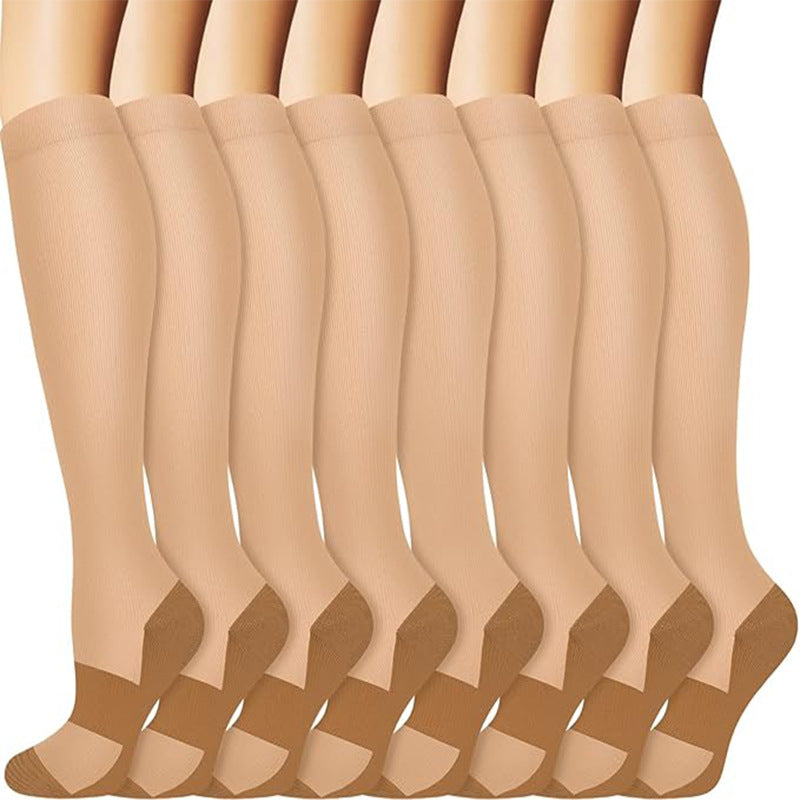 Compression socks in striped and printed styles arranged as a matching pair set