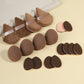 Makeup sponge set with teardrop and olive foam blenders and soft velvet powder puffs
