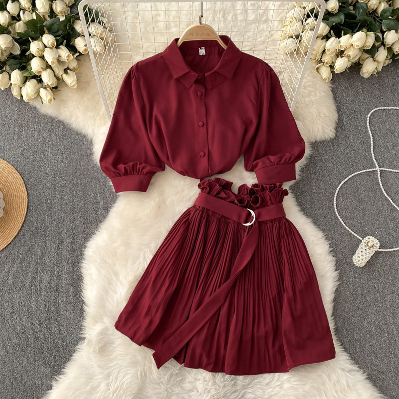 Shirt and skirt set shown paired with simple everyday accessories