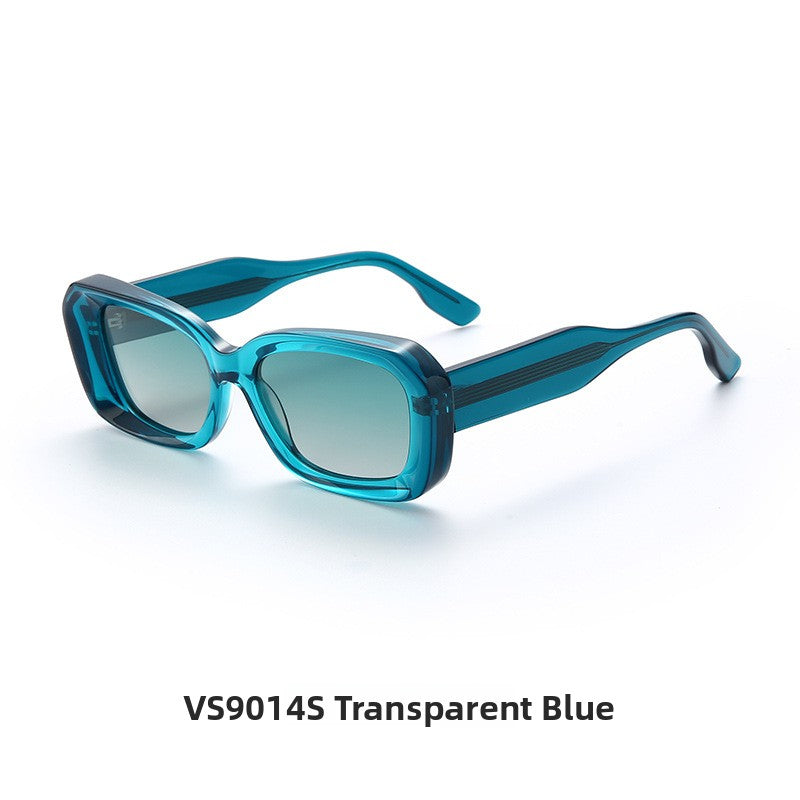 Close view of the chunky acetate frame and hinge on the retro square sunglasses