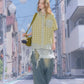 Green plaid short sleeve doll collar shirt folded and presented