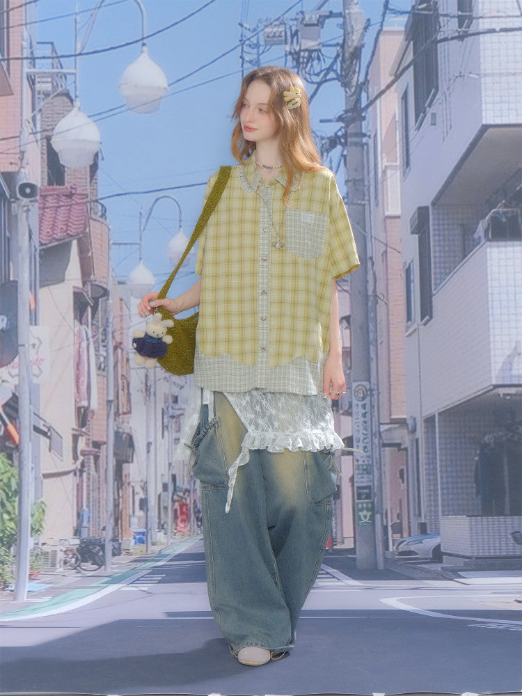 Green plaid short sleeve doll collar shirt folded and presented