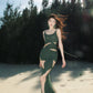 Front view of the slim knit bodice and just above the knee hem on bare legs