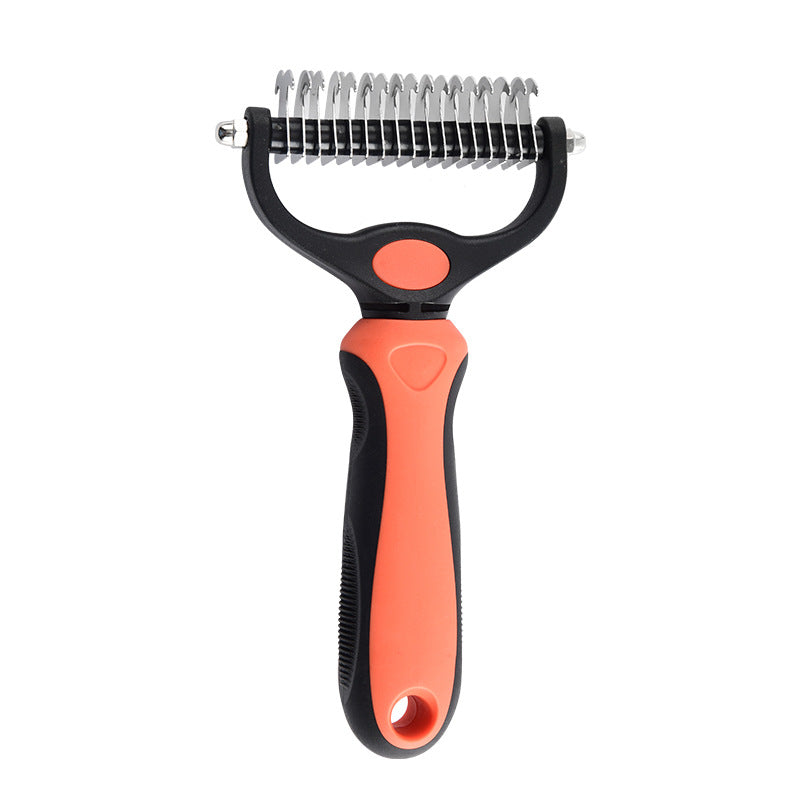 Pet dematting comb held in a hand to show the non-slip TPR grip and the double sided head