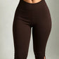 Brown high-waisted slim-fit capri leggings with wide waistband, size S option photo