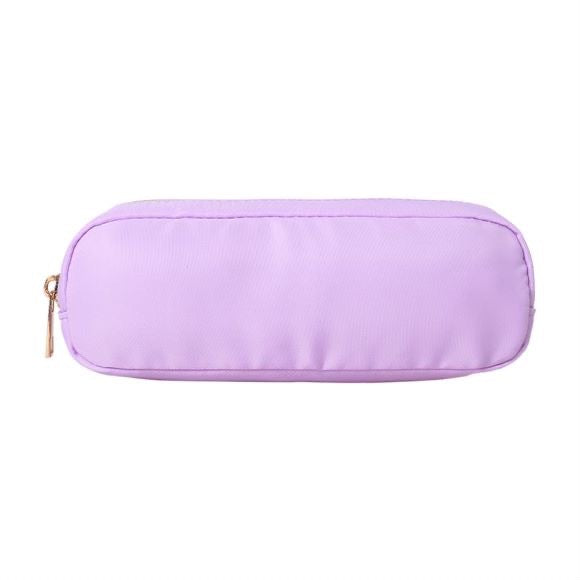 Top down view of the pencil case open with pens, pencils and erasers inside