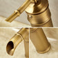 Close up of the antique copper bamboo faucet spout, valve body and segmented column