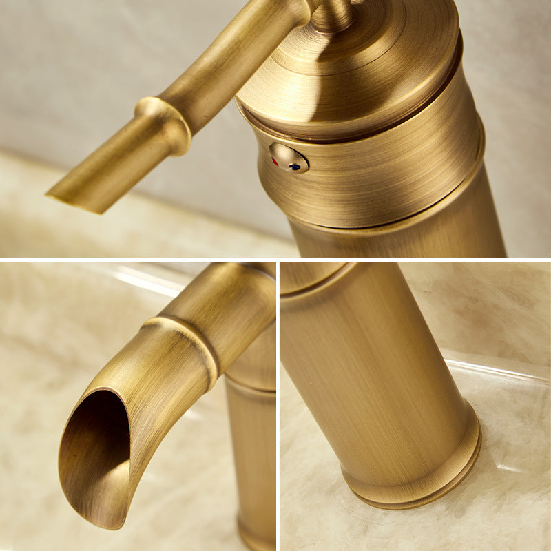 Close up of the antique copper bamboo faucet spout, valve body and segmented column