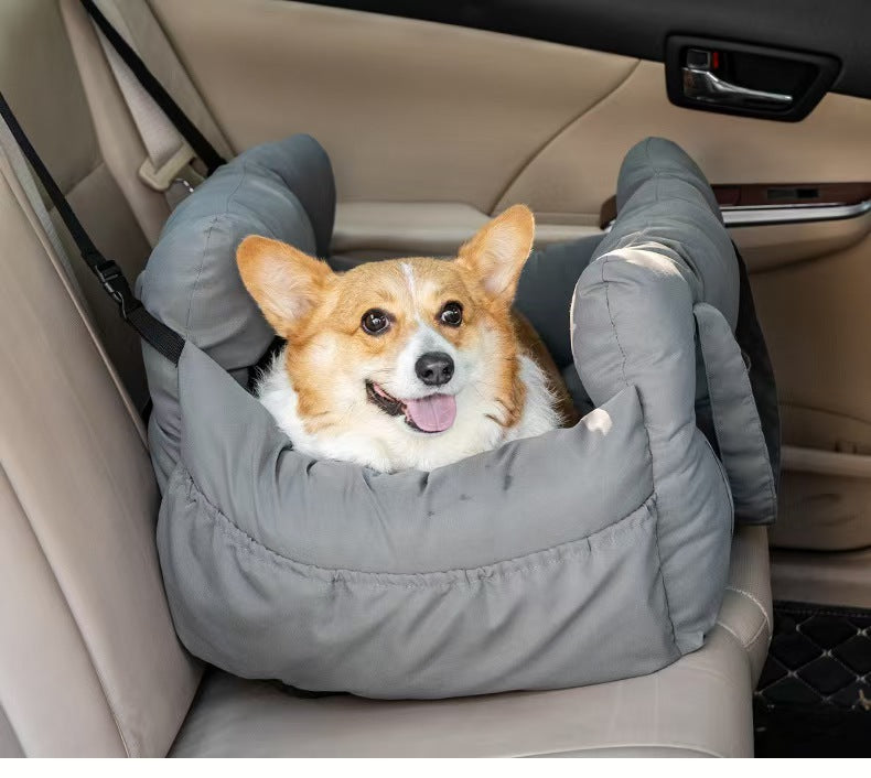 Padded car seat pet bed with raised bolster walls, carry handles and an inner clip detail of the padded bolster wall