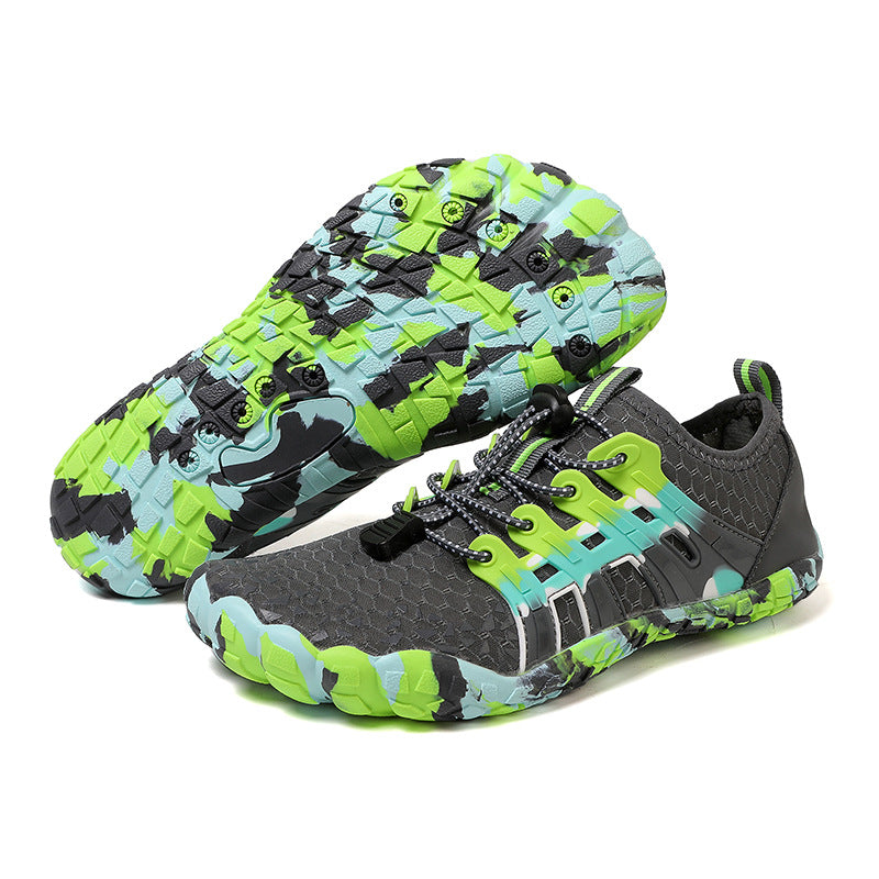 A black and rose red pair of barefoot water shoes with mesh upper, bungee lace and wide split toe box